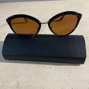 Prada made in Italy sunglasses with case.